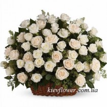 The funeral basket of white roses